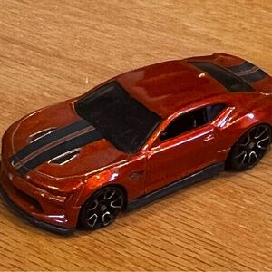 Vibrant Orange Toy Car with Black Accents